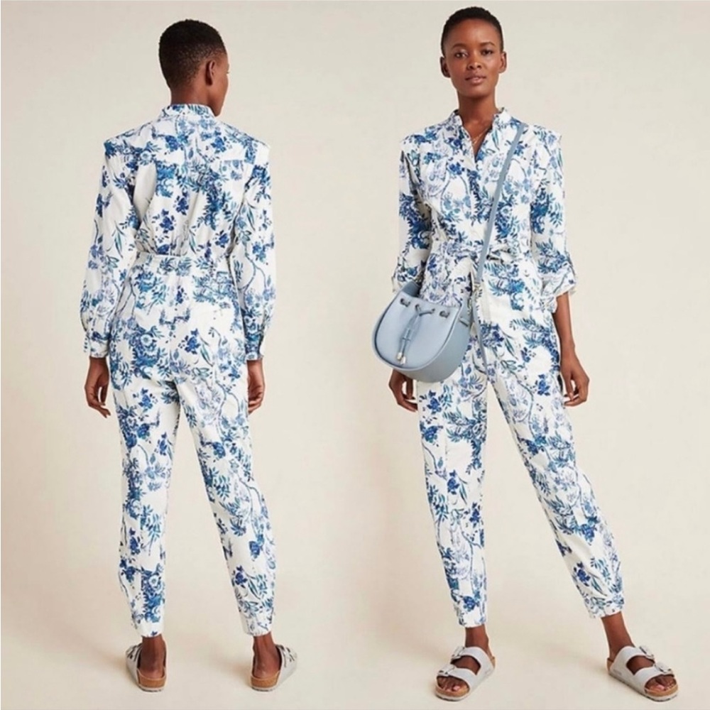 Blue and white floral romper size 6.  NWT.